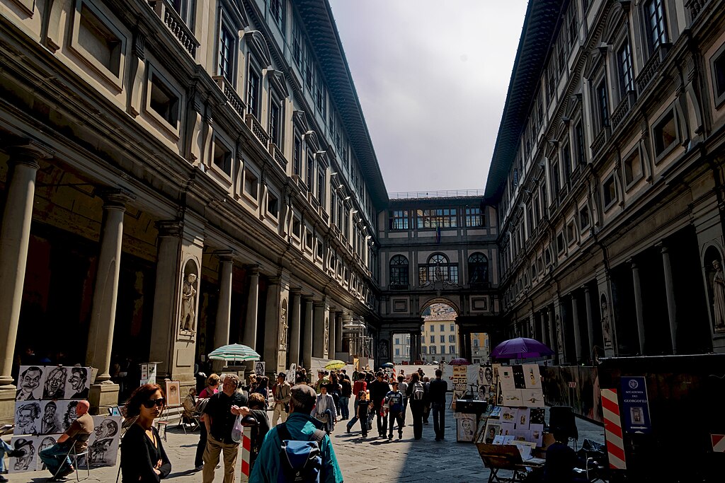 Photo of the Firenze in Florence, Italy. The text argues that this was the first office.