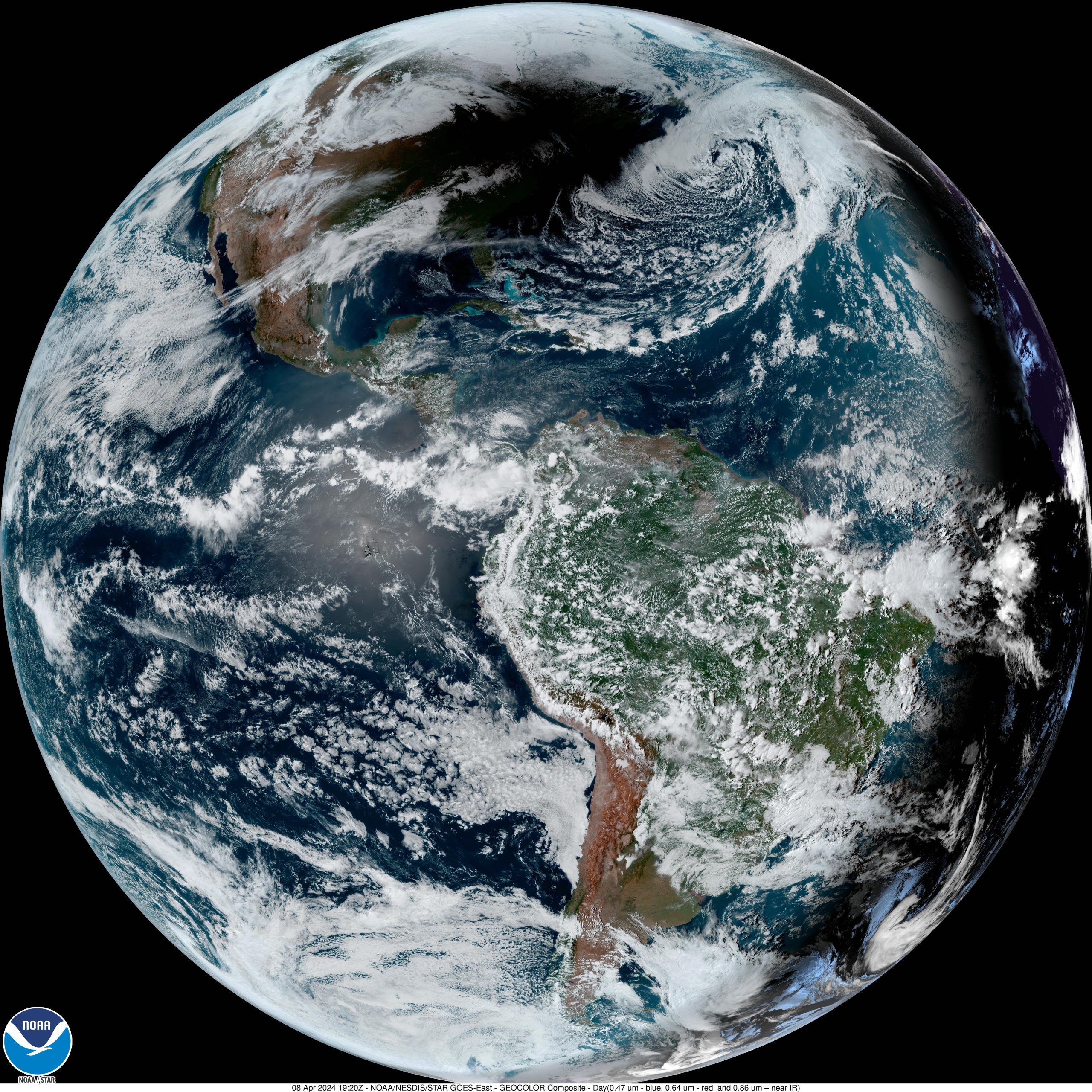 Photo compiled by NOAA from the GOES East satellite image of April 6, 2024 during the total solar eclipse. Image shows the shadow of the moon on the Earth as a dark patch with a few gray clouds.